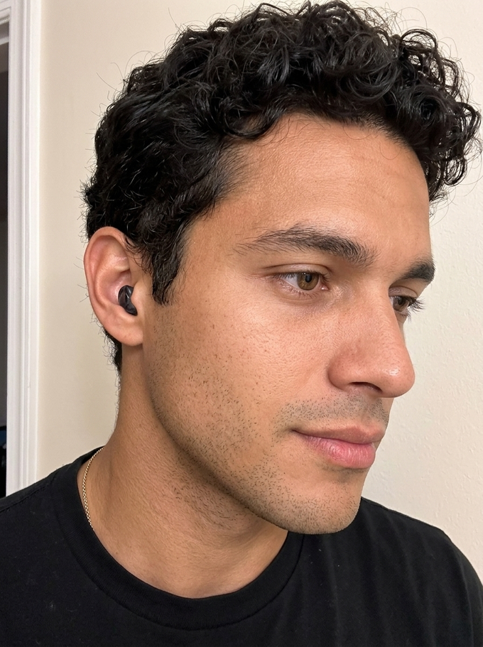 Jordan T. wearing a Quiet earplug