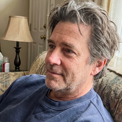 Tom B., a Quiet customer, photographed at home